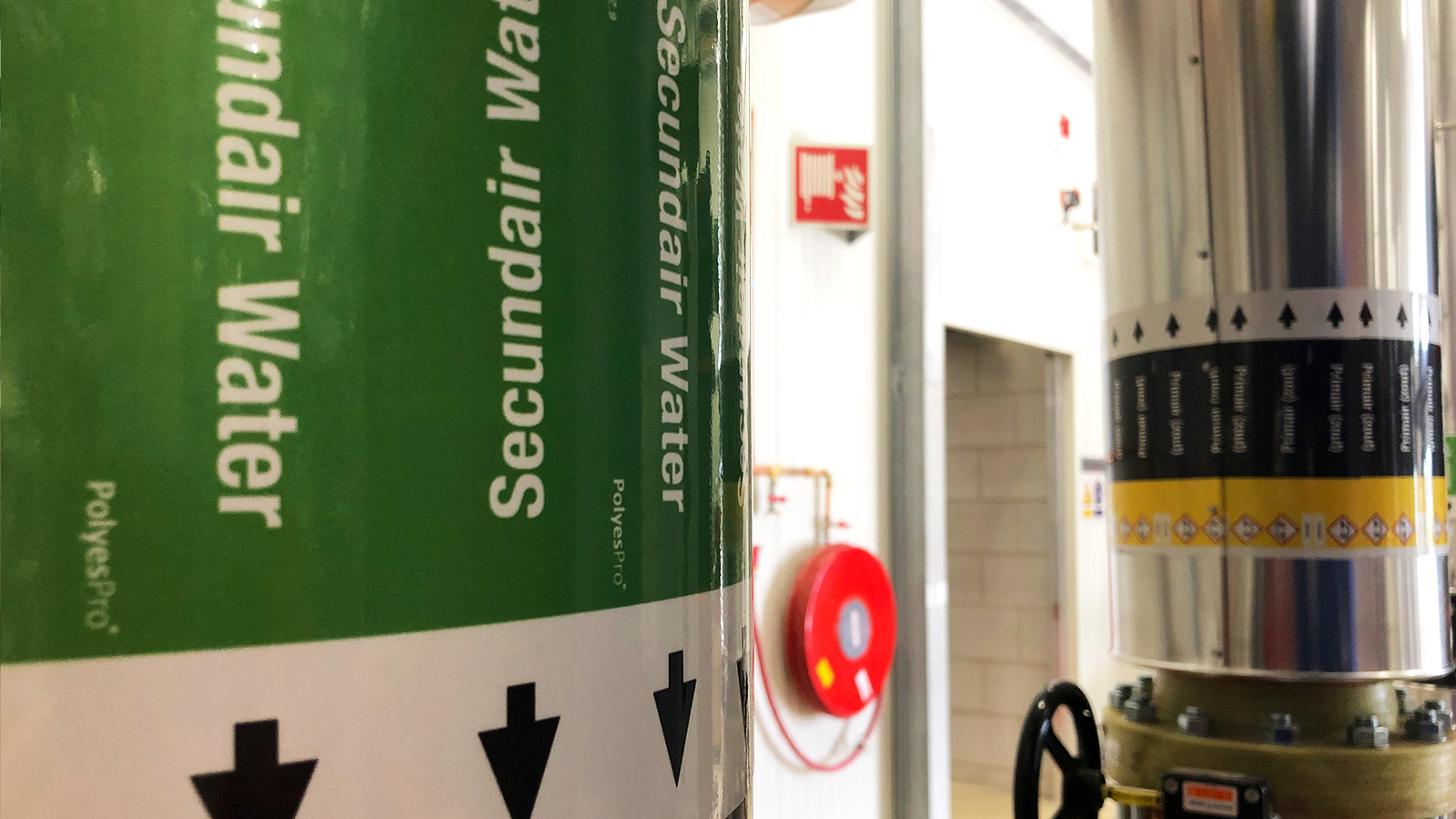 Pipe Marking ISO20560 TRIAS Westland Geothermal site by Blomsma Signs & Safety