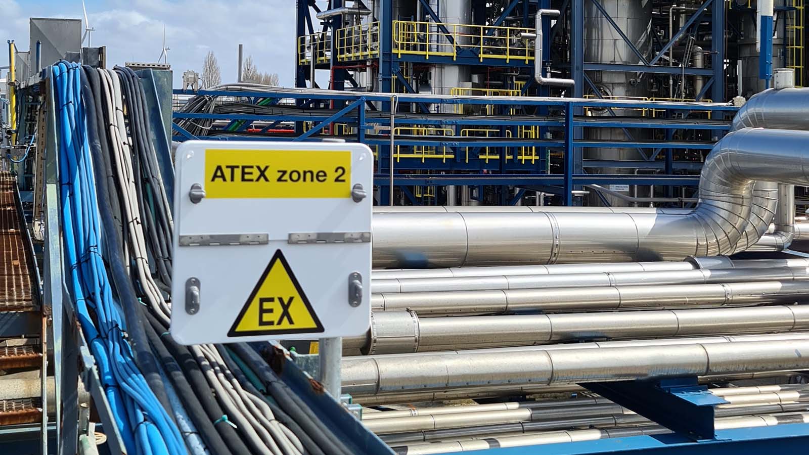 Safety signage, EX zone signs, wayfinding Delamine Delfzijl by Blomsma Signs & Safety